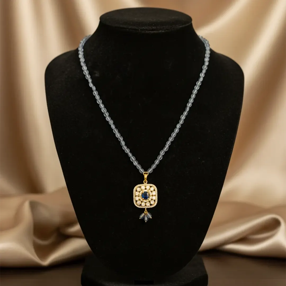 Elegant Sapphire & Diamond Halo Necklace Elegant Sapphire & Diamond Halo Necklace - Image 1